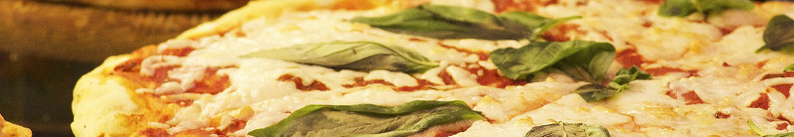Eating Italian Pizza at Carini's Express Italian Food restaurant in Danville, VA.
